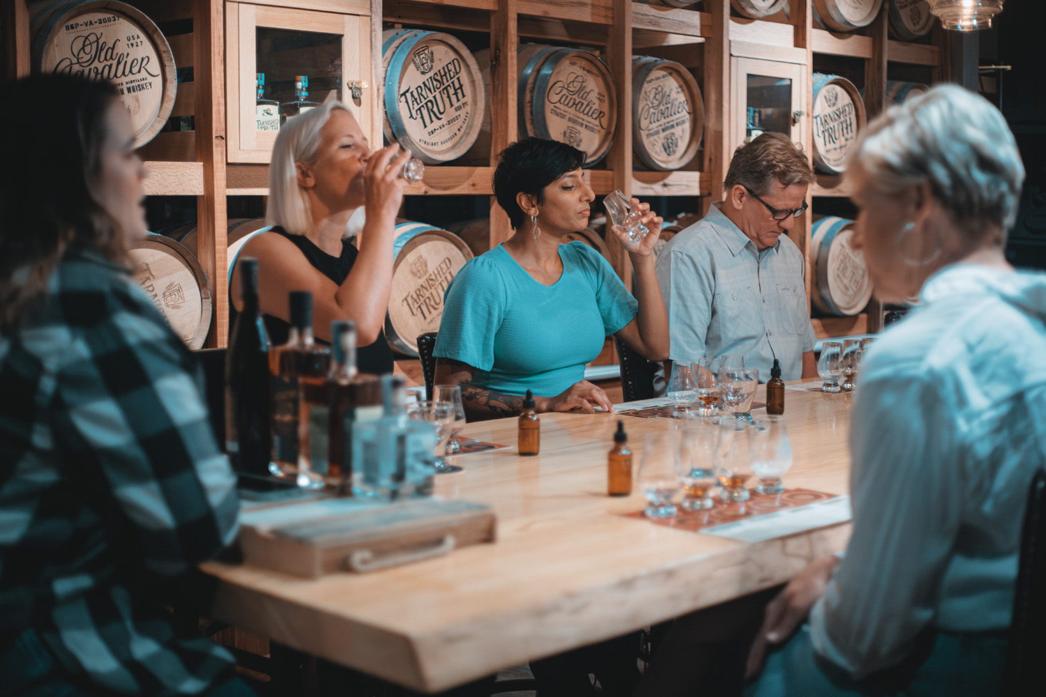 A distillery tour with a group of people inside Tarnished Truth Distilling Company