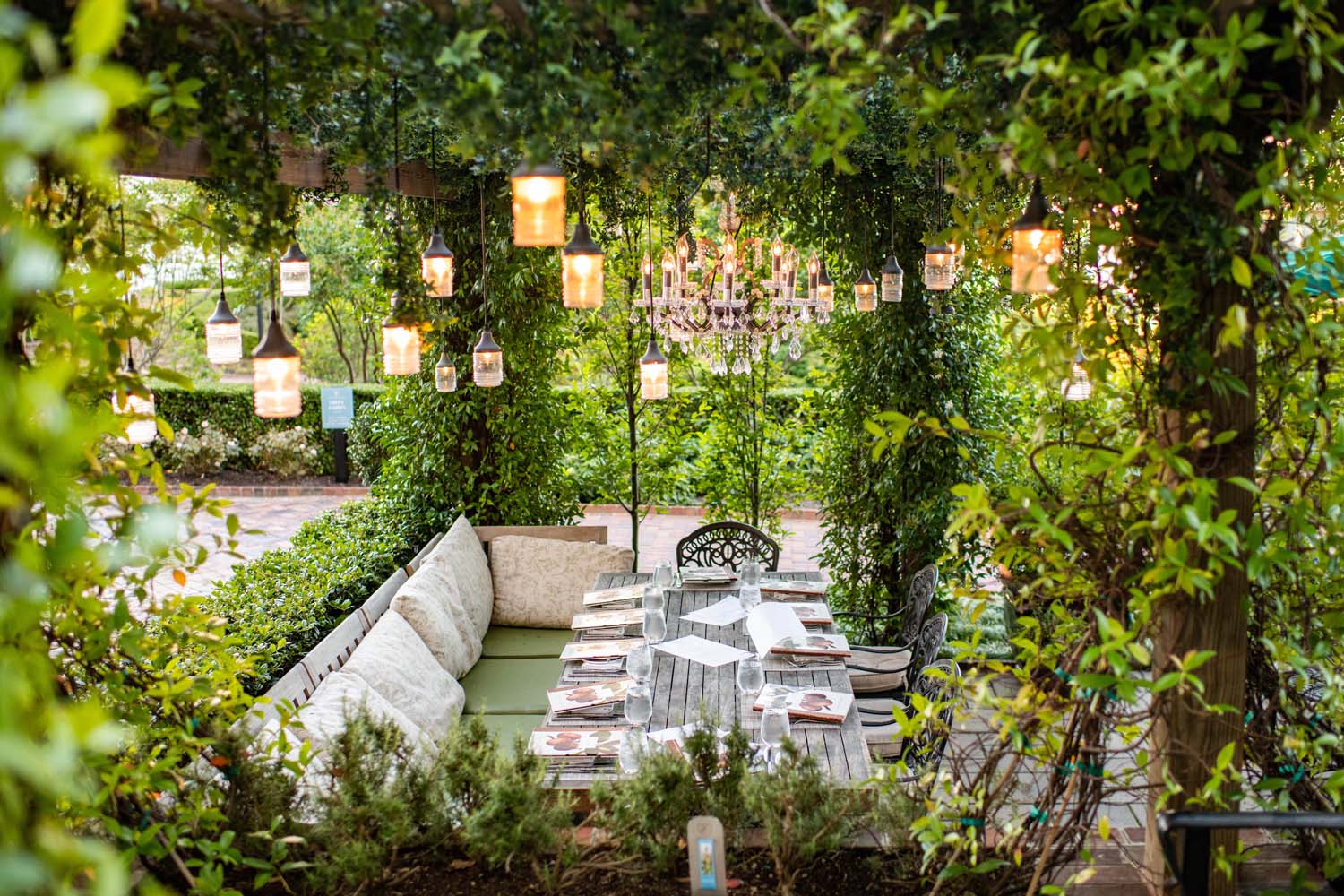 The exterior dining patio area outside Becca Restaurant & Garden