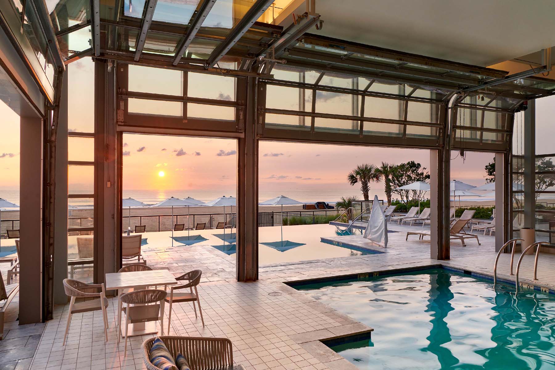 The indoor pool at the Marriott Virginia Beach Oceanfront Resort at sunrise
