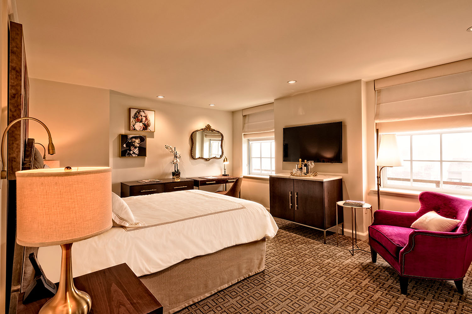 A deluxe guest room inside The Historic Cavalier Hotel