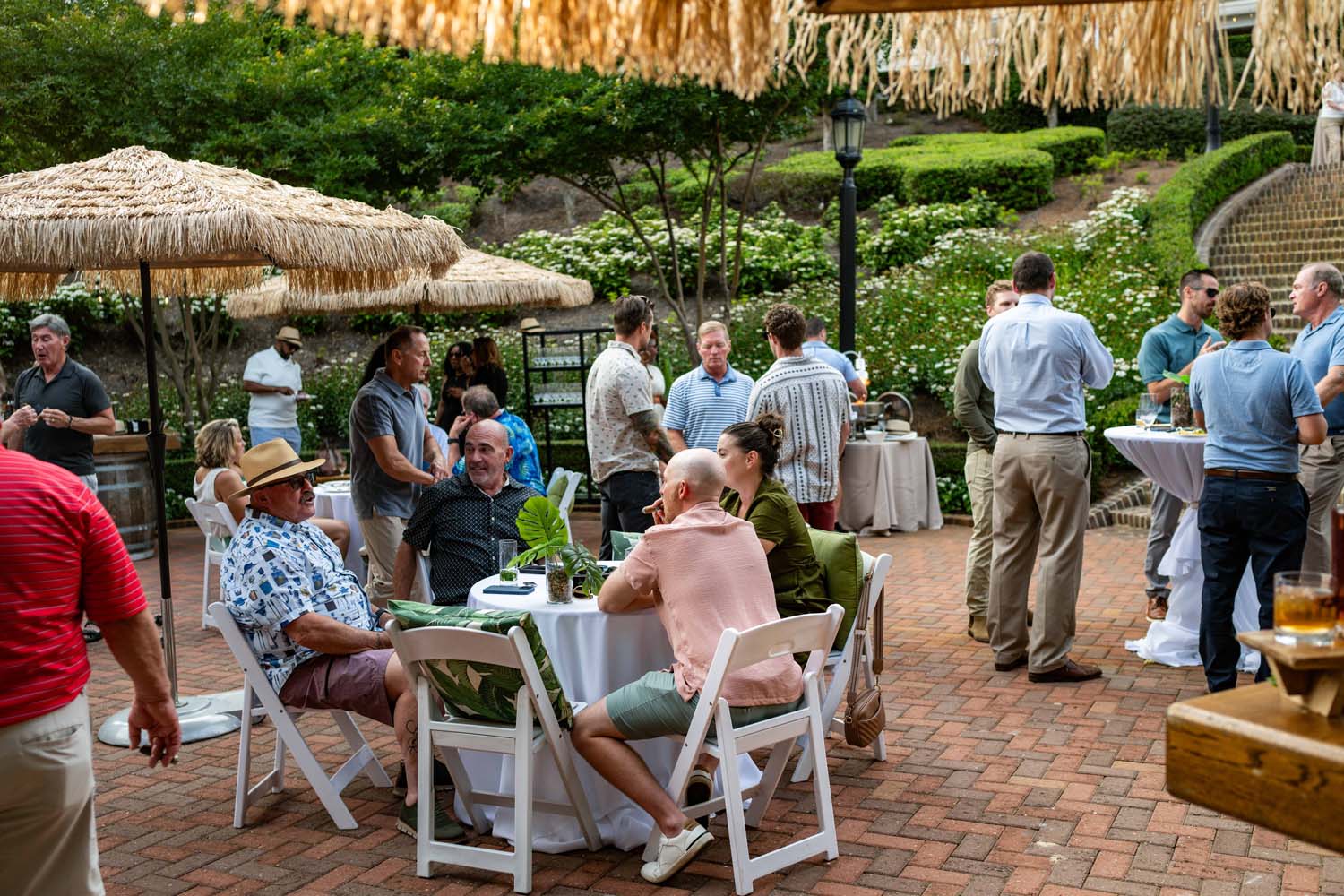An outdoor party inside the sunken garden at the Historic Cavalier Hotel