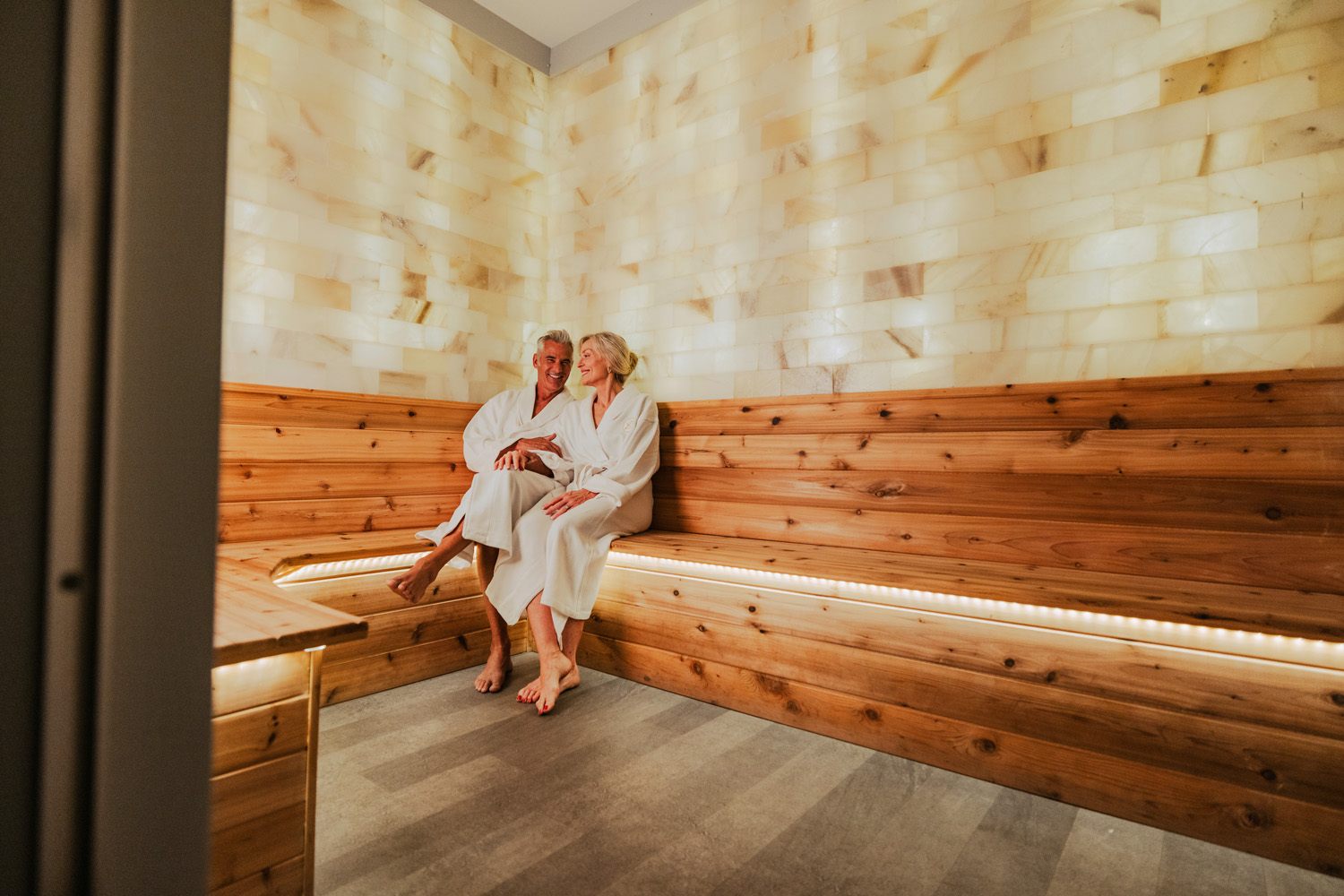 A couple in the sauna at The Cavalier Hotel's SeaHill Spa
