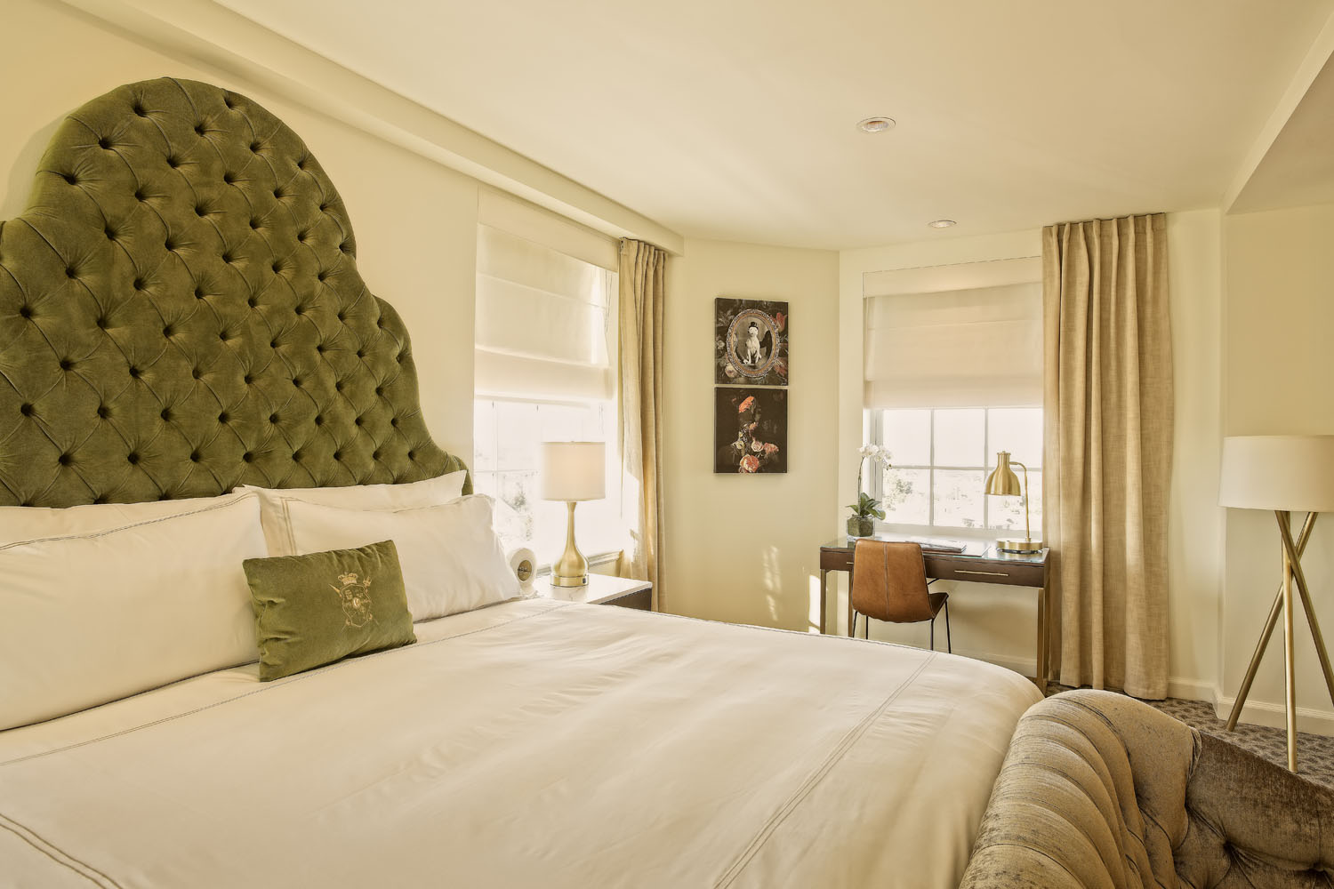An interior king bedroom inside The Historic Cavalier Hotel