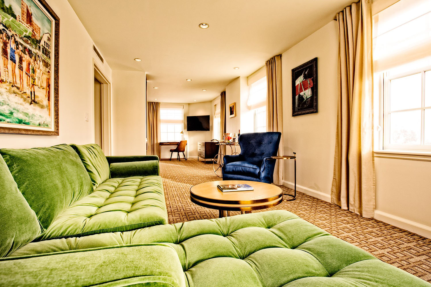 A king bedroom suite inside The Historic Cavalier Hotel