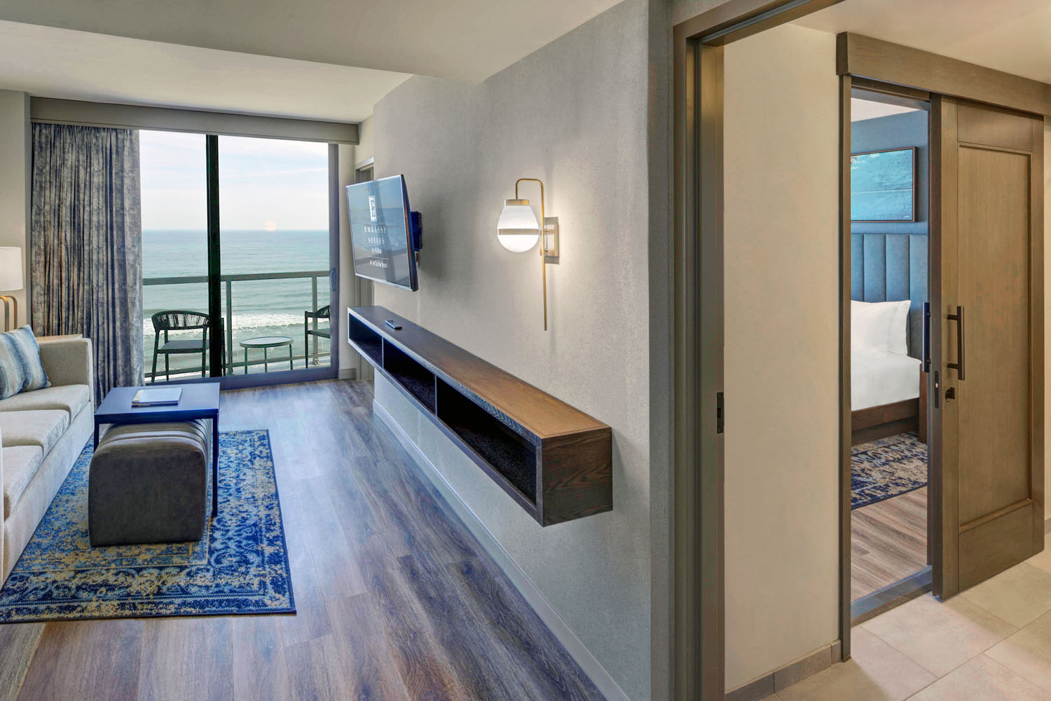 A king oceanfront two-room suite at the Embassy Suites Virginia Beach Oceanfront Resort
